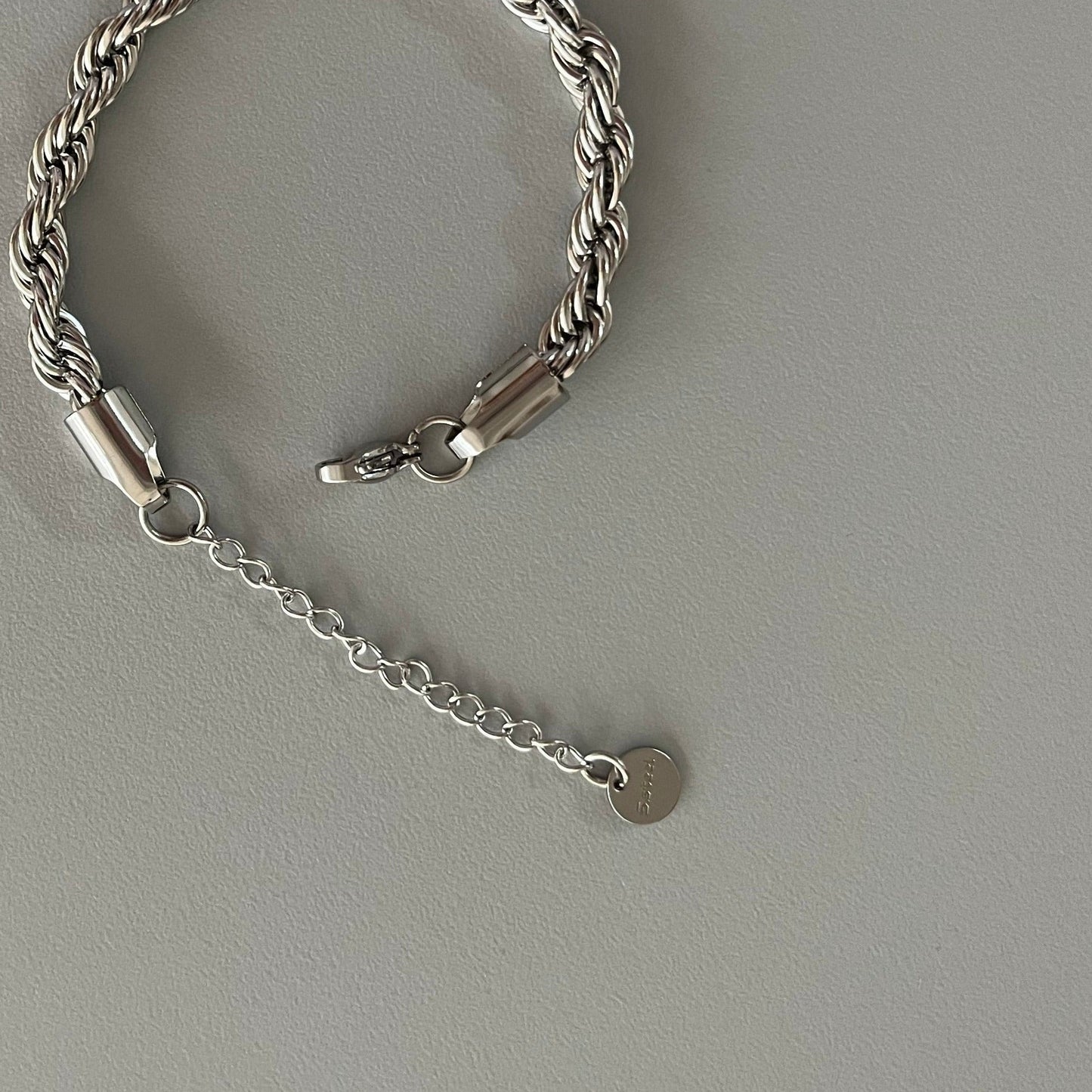 Pulsera cadena torcida