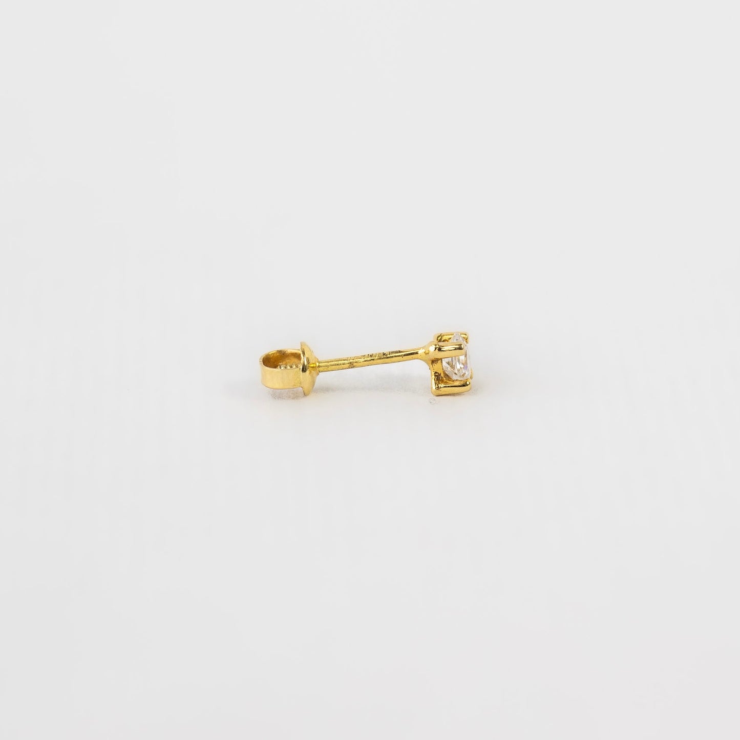 Broquel zirconia chica oro 14k