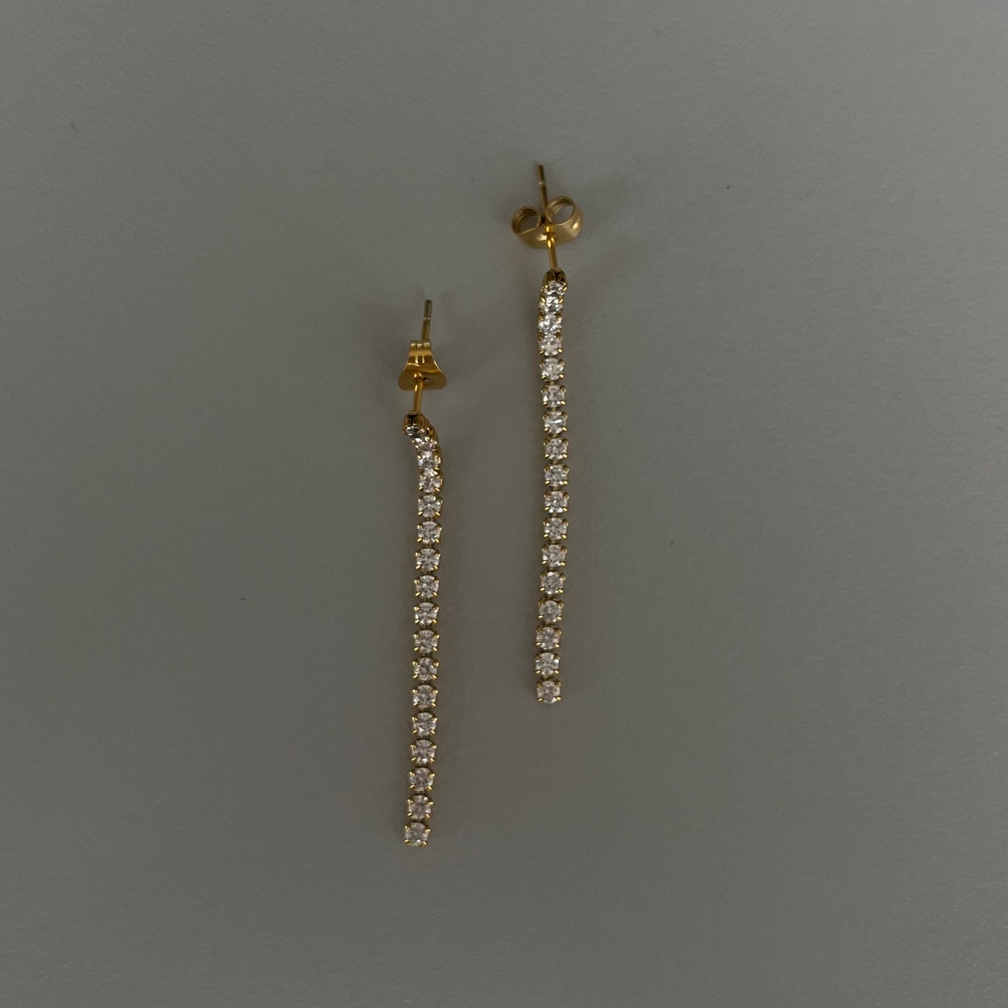 Aretes largos fila