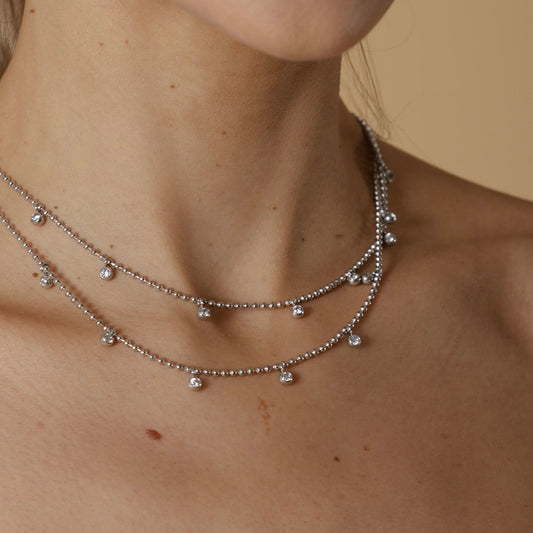 Collar doble bolitas