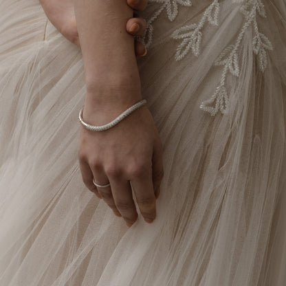 Brazalete curveado