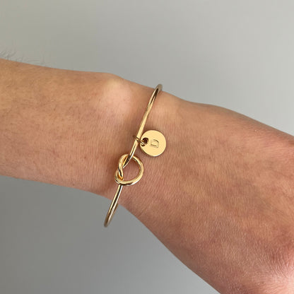Brazalete iniciales