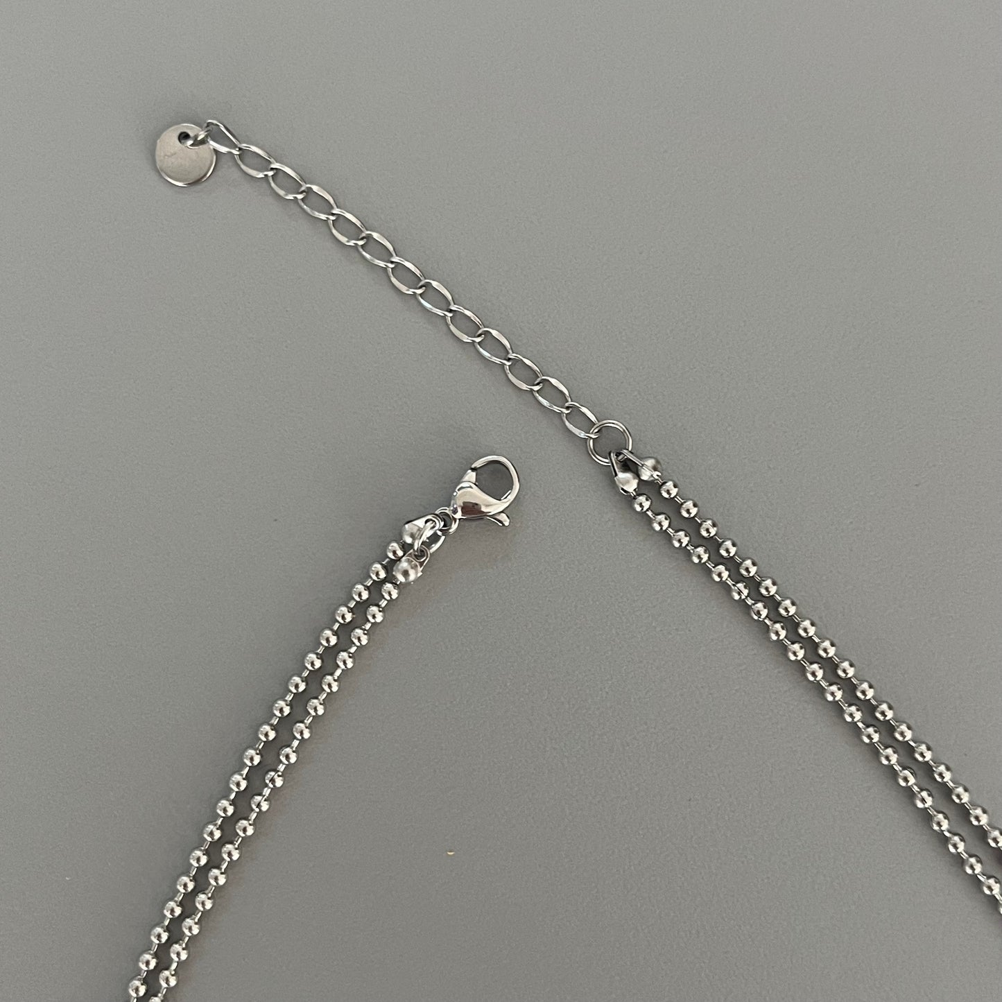 Collar doble bolitas