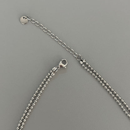 Collar doble bolitas