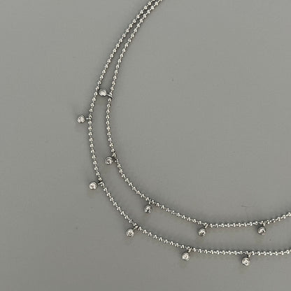 Collar doble bolitas