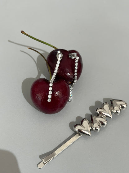Aretes largos fila
