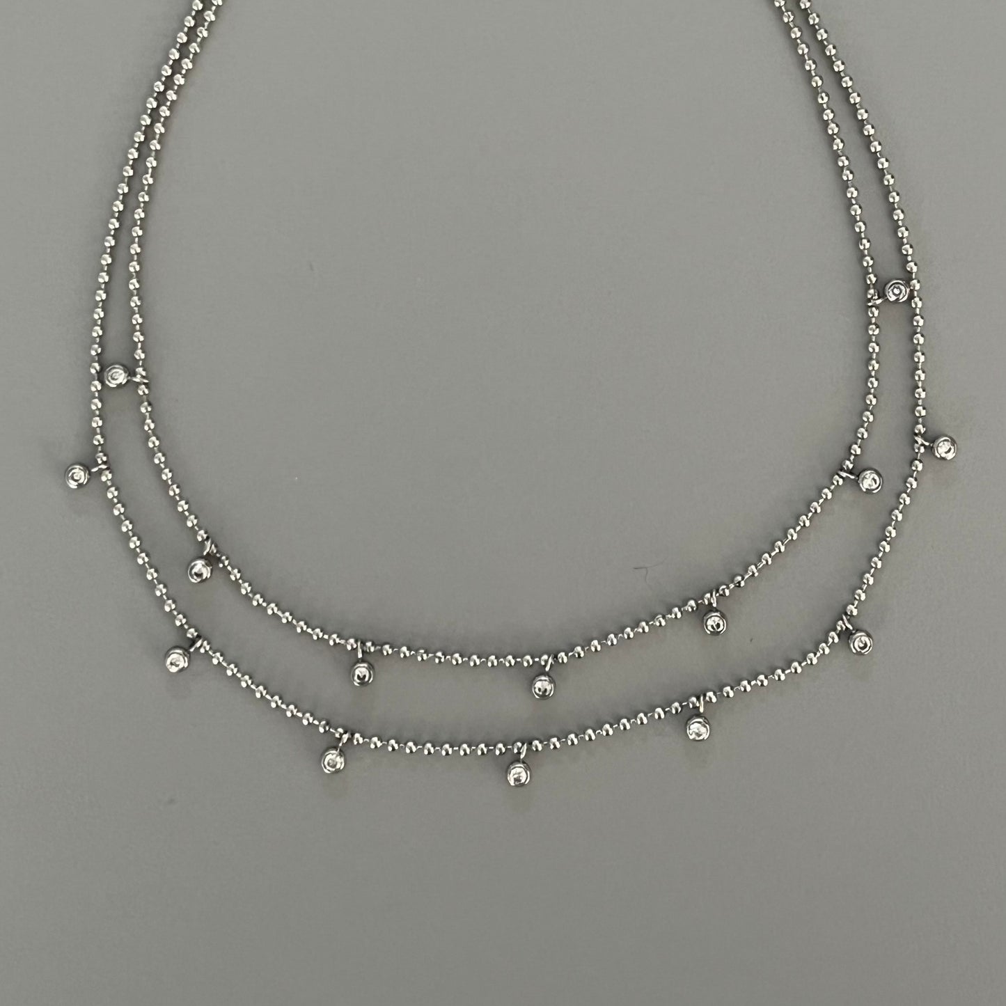 Collar doble bolitas