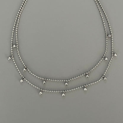 Collar doble bolitas
