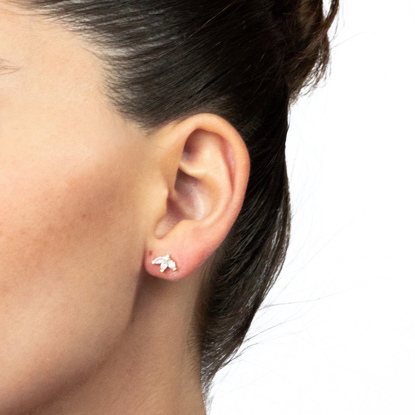 Aretes media flor