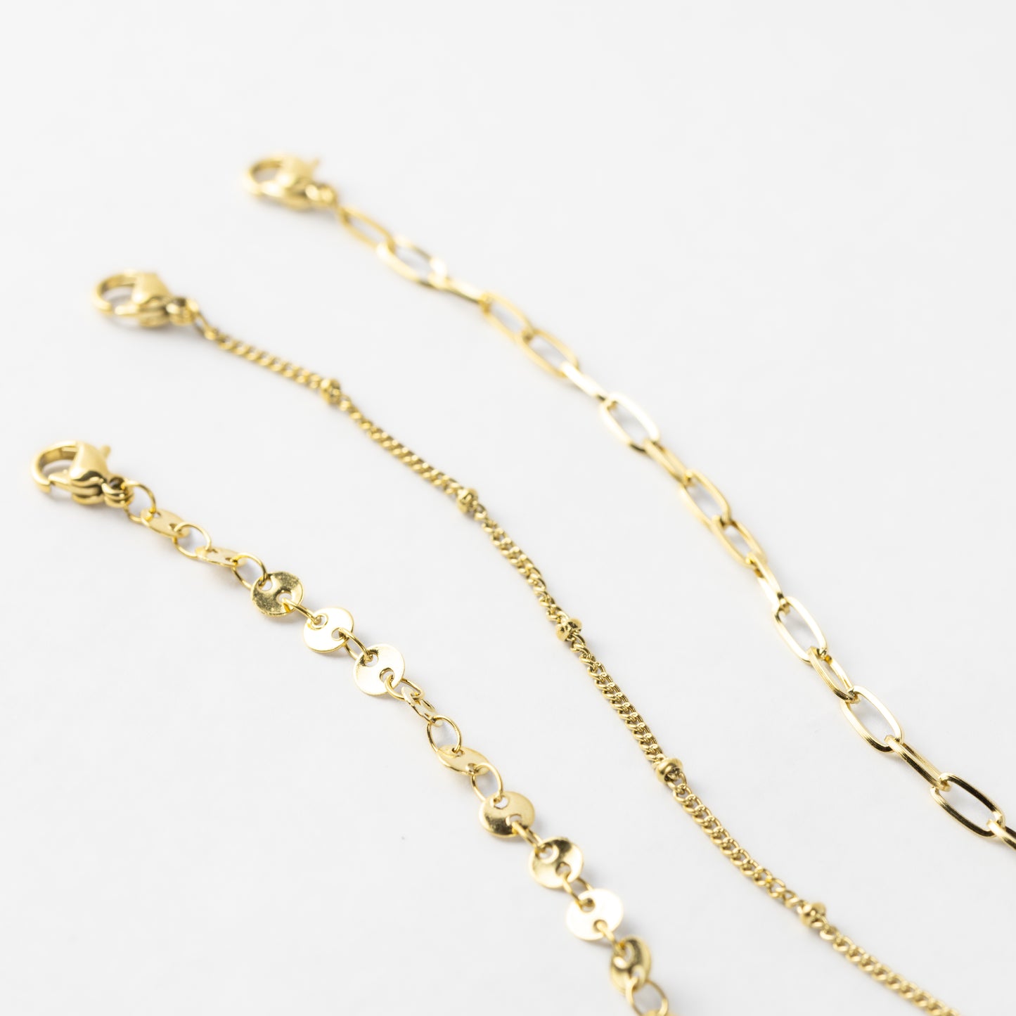 Set pulseras de círculos y cadena