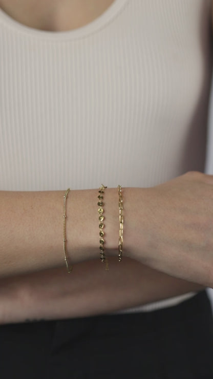 Set pulseras de círculos y cadena